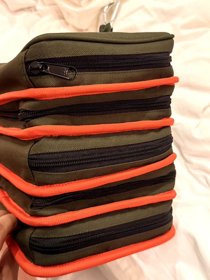 Close-up of DashKit stitching, piping and zip detail