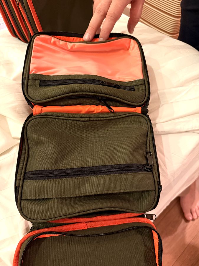 DashKit prototype open, showing sealed lining and frosted inner pockets