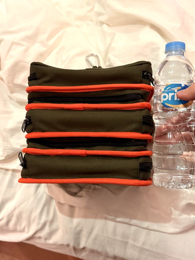 DashKit prototype next to a water bottle for scale